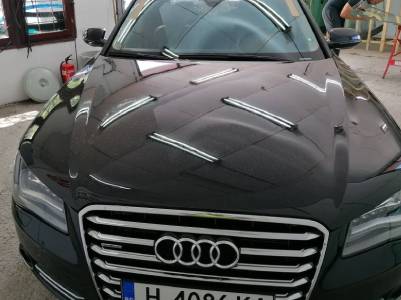Black Audi SUV fixed front glass